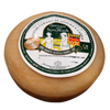 Round cheese with a label on a white background